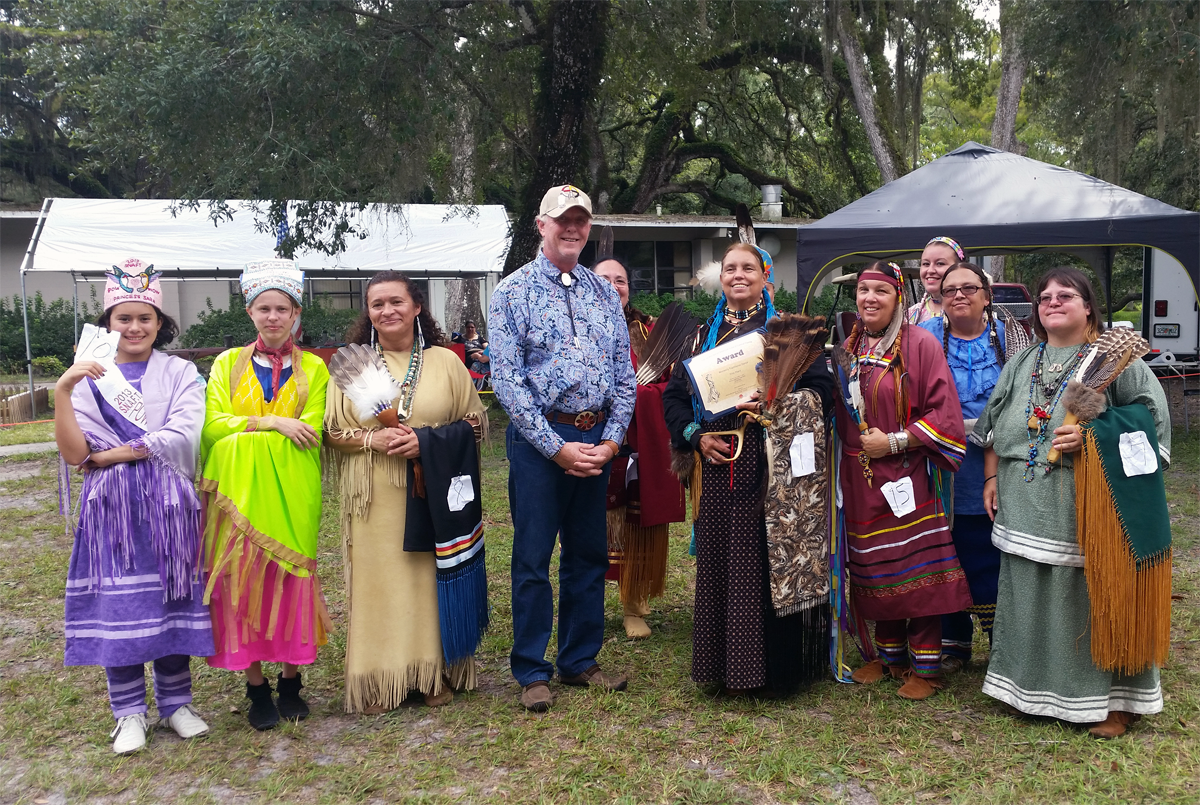Dr. Anthony B. James, awards Traditional Dress at Pow wow
